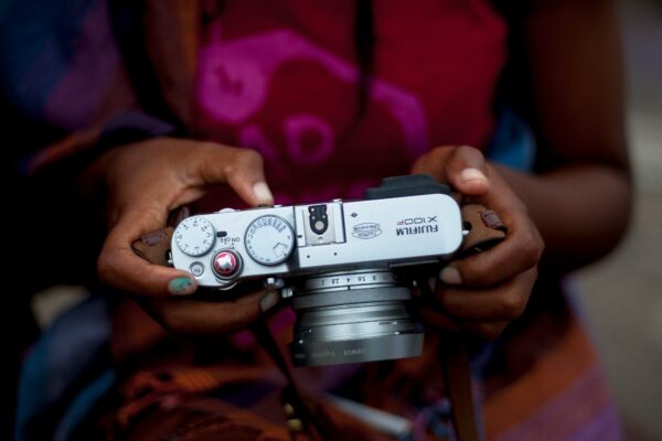 A fujifilm camera in the hands of a customer