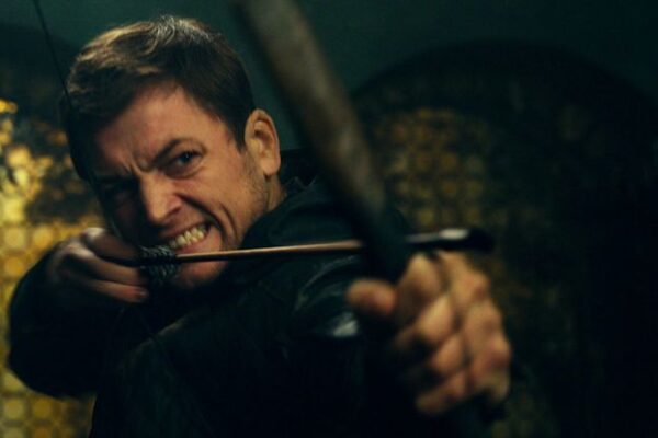 Taron Egerton Brooks Nader relationship